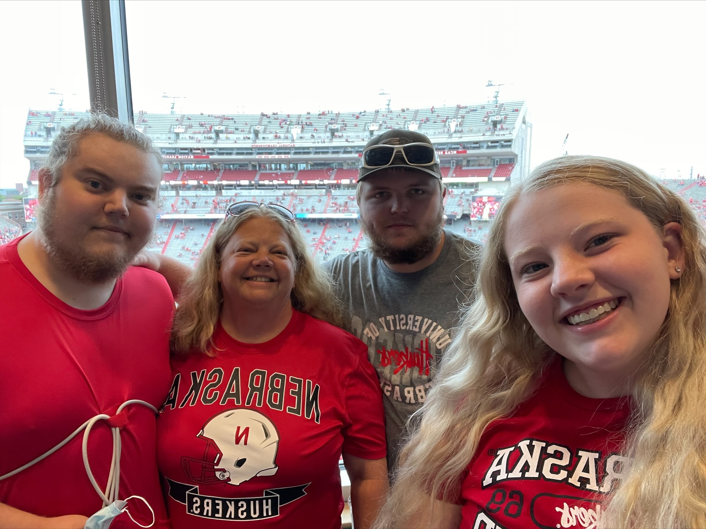 Ethan with his mom, brother, and sister