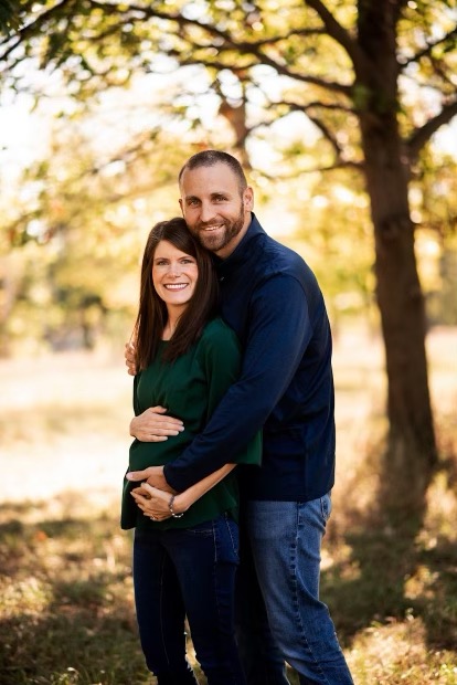 Courtney and Spencer Werner pose for a photo during Courtney's pregnancy